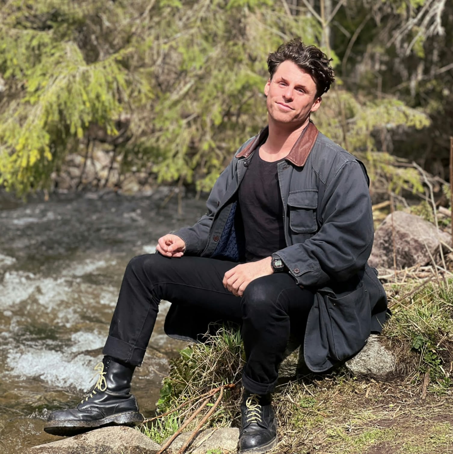 Damian Jeffries, founder of Offgrid Water, beside a stream